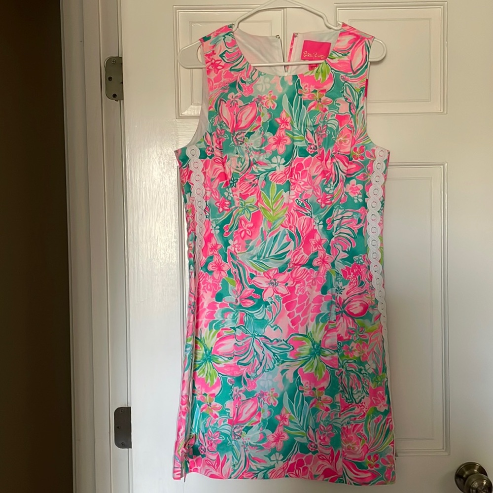 Lilly Pulitzer BRAND NEW TAGS ON size 10 dress. Cute ribbon and lace detail.